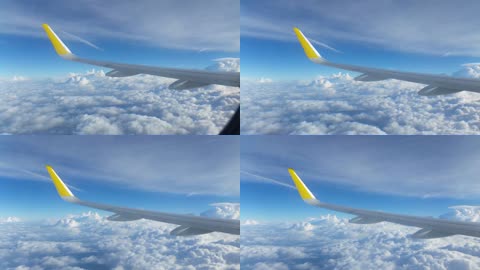 飞机飞行高空云端窗口景色