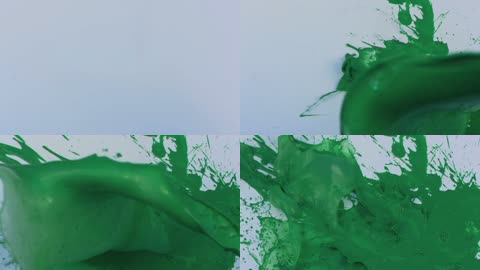 慢动作绿色的油漆飞溅
