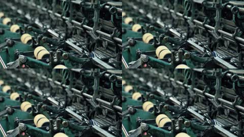 纺织厂生产织物机器特写