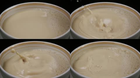 超清实拍奶茶中加入糖块视频素材