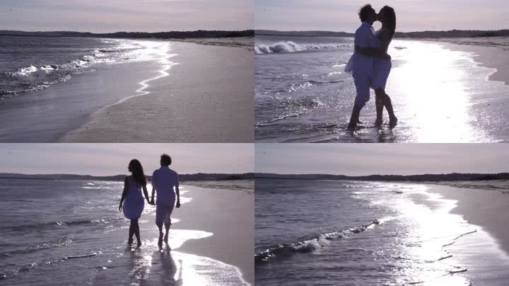 实拍海边散步的情侣
