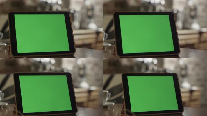 绿屏桌子上的平板电脑抠像素材