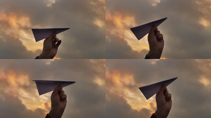手拿纸飞机 放飞纸飞机 