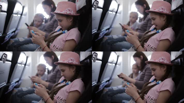 小女孩 坐飞机 旅行 使用手机 