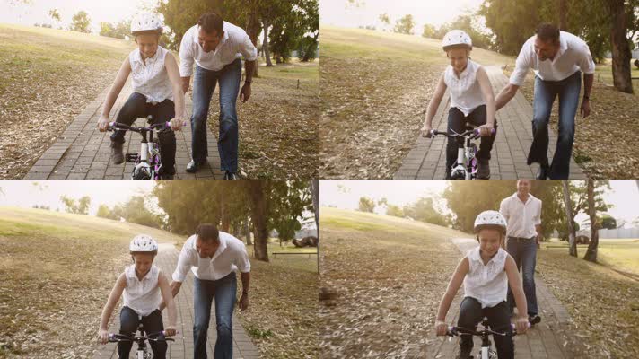 父亲 戴头盔 小孩学骑自行车  