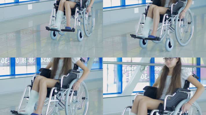腿上绑带 坐着轮椅 轮椅  