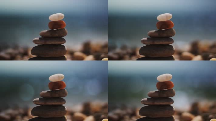 岸边石子摞在一起平衡