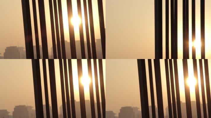 雾霾天掠过栅栏的晨阳