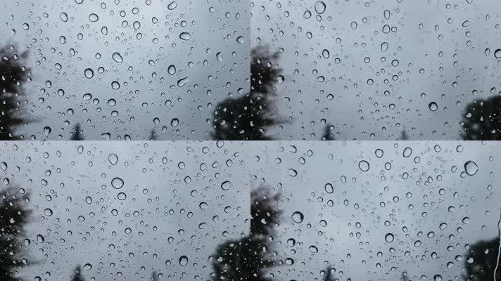 下雨，玻璃窗雨滴滑落