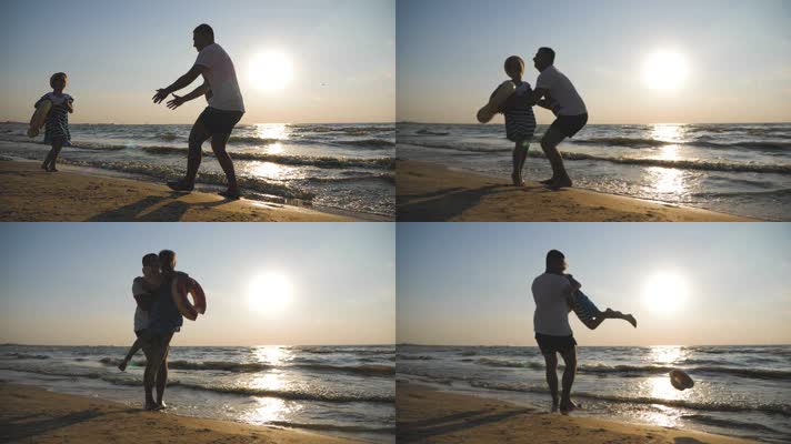 海边日落夕阳父女玩耍亲子陪伴