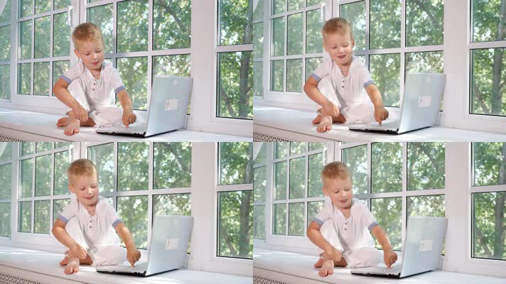 小男孩玩电脑
