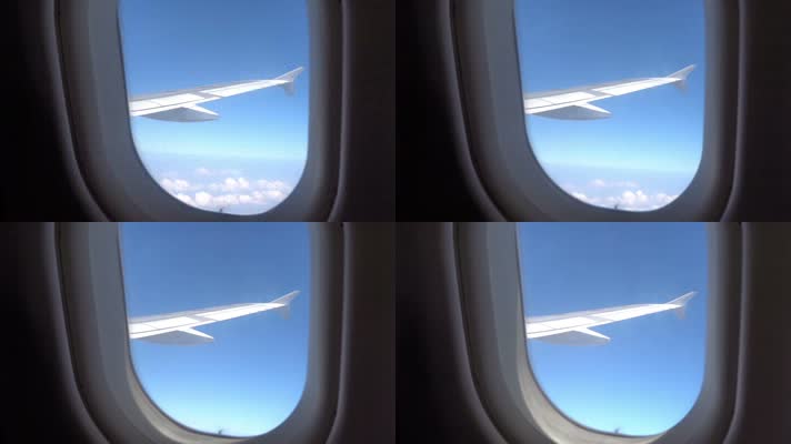 飞机窗口，机舱薄云穿云穿越
