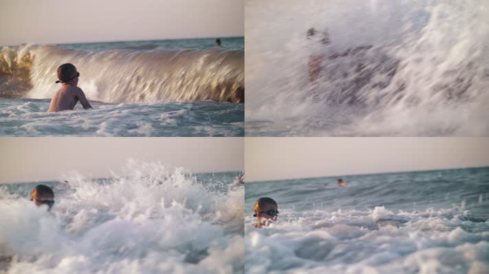 小孩大海里玩水冲浪