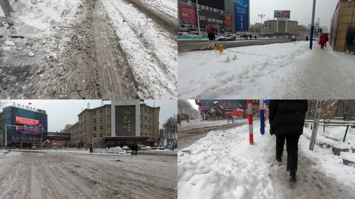 下大雪恶劣天气城市繁华街道的交通行人