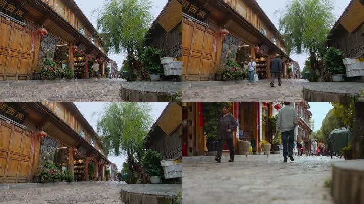 云南大理古城石板路走过的游客