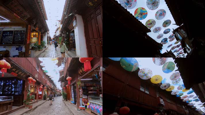 云南丽江古城游客跟拍纸雨伞网红街
