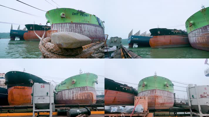 深圳造船厂被绳索固定在岸边的巨轮