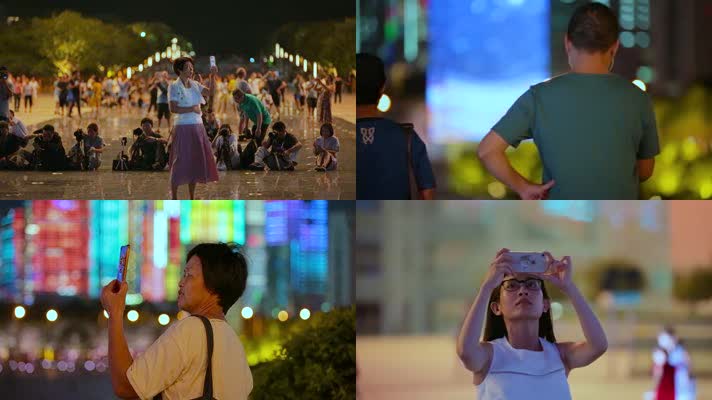 深圳灯光秀视频夜晚观看灯光夜景的市民