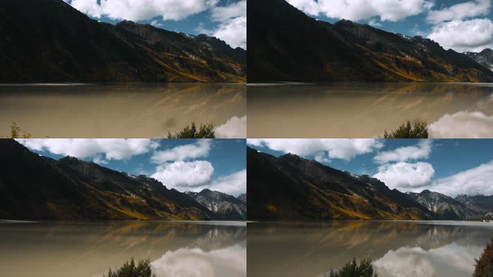 4k高原湖水视频藏区然乌湖山川倒影
