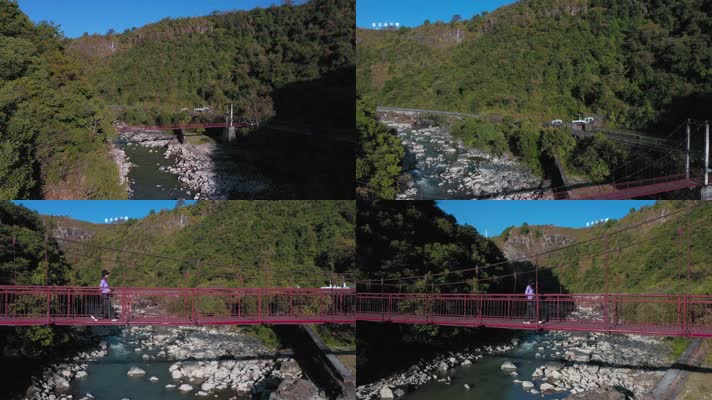 4k云南风光视频腾大山河谷间的吊桥女游客