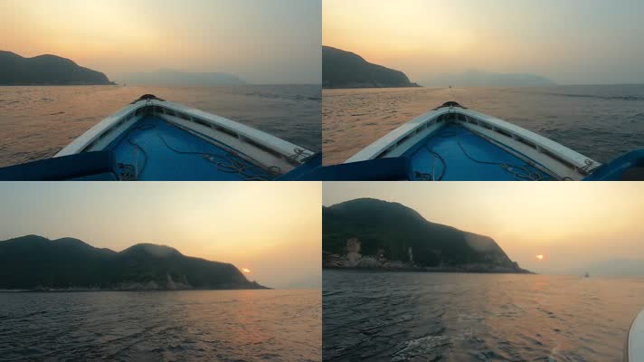 快艇在海面上迎着夕阳飞驰