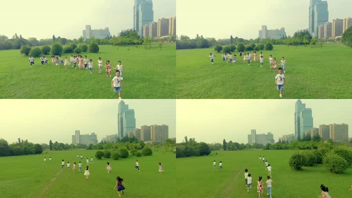 一群孩子草地上开心奔跑