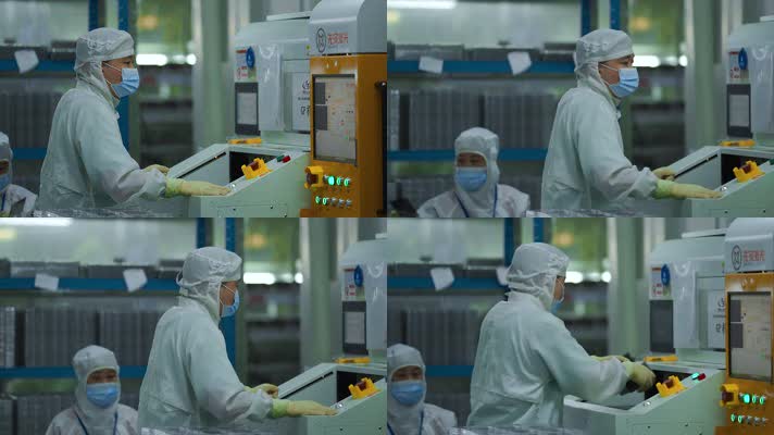 工业科技视频穿防尘服操作电脑的工人