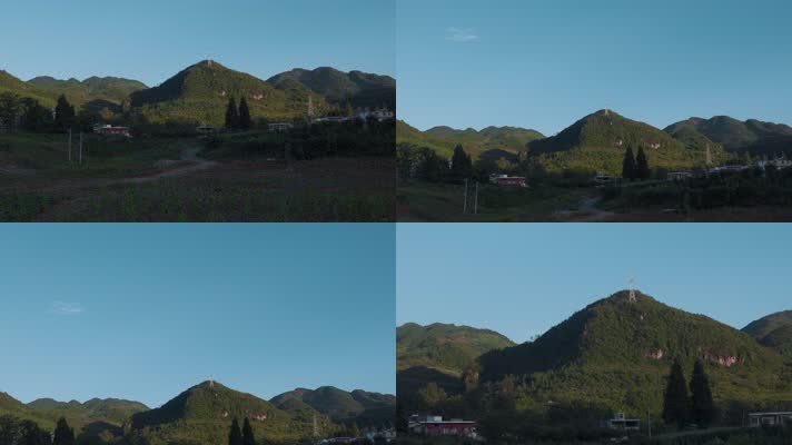 4k山丘视频蓝天下的小山山脚房屋