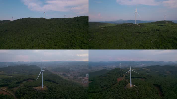 风力发电视频矗立在山颠森林里的发电风车