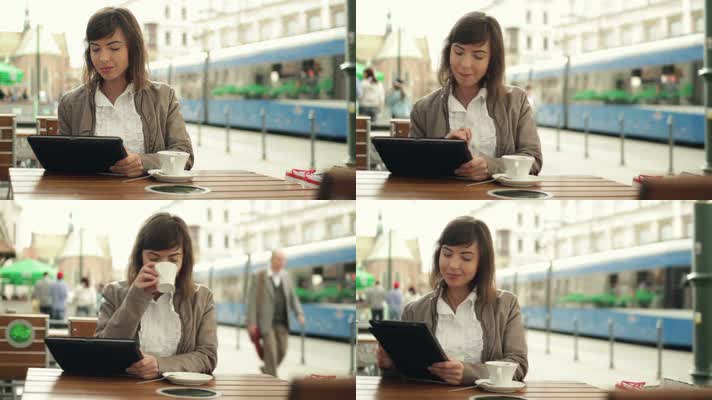 一名女子在城里用平板电脑喝咖啡