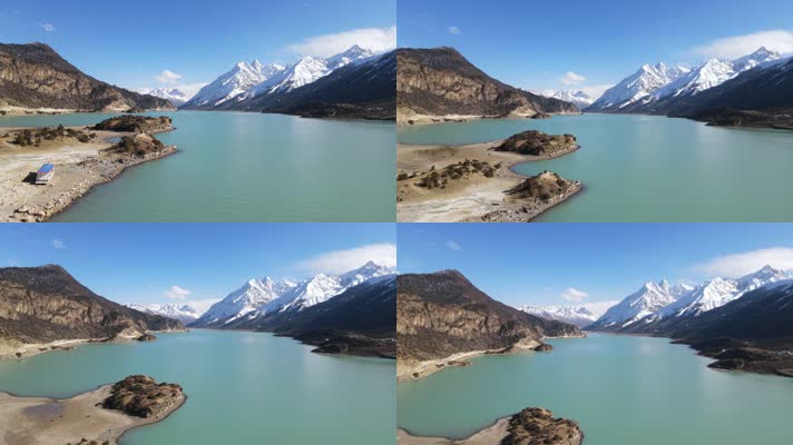 航拍西藏318国道旁雪山下的碧绿色然乌湖