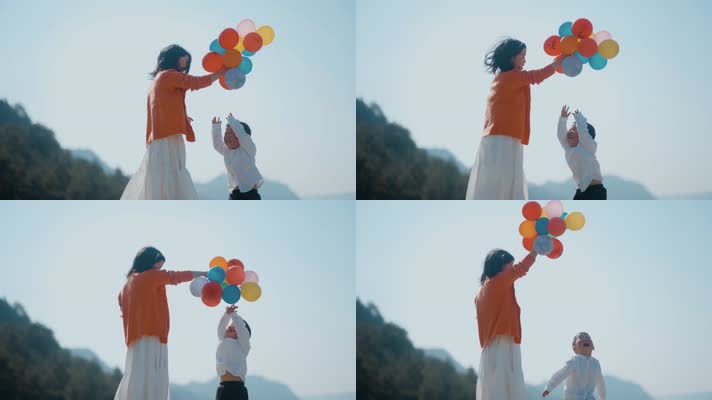 温馨母亲陪小孩玩气球小孩高兴蹦蹦跳跳母爱