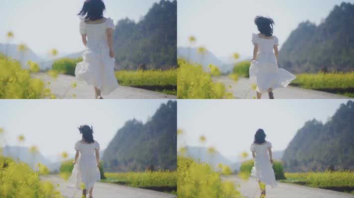 唯美女生穿白裙奔跑追逐希望和梦想油菜花林