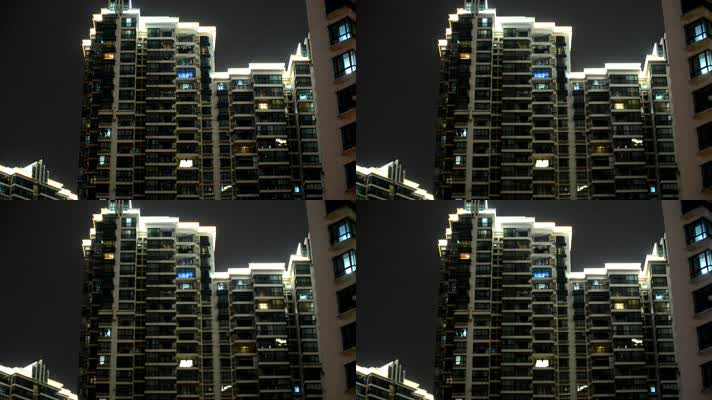 城市夜晚高层居民楼外观仰拍