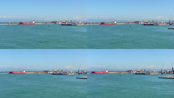 港口码头船载着货物海面航行