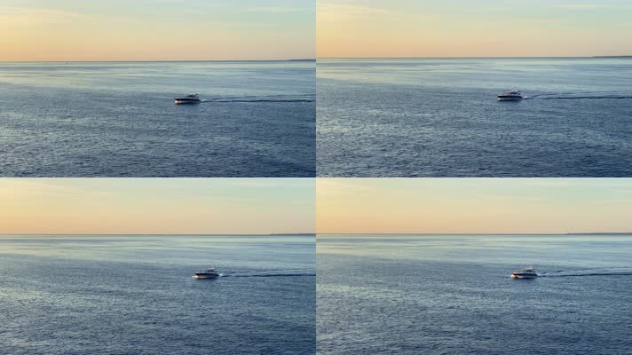 日落时海上的游艇航行