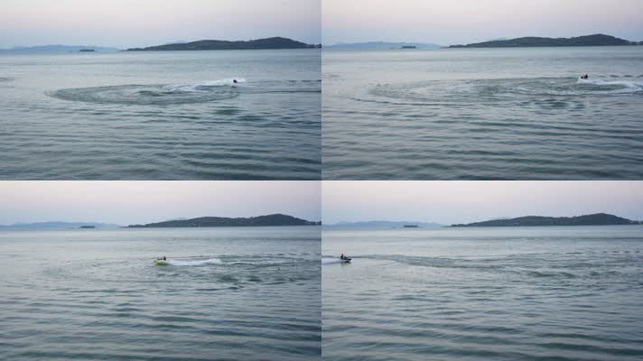 男人骑快艇在海面上愉快玩耍激起浪