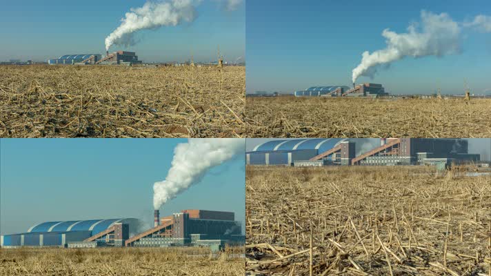 低碳热电厂大烟囱冒烟北方冬季玉米秸秆田地
