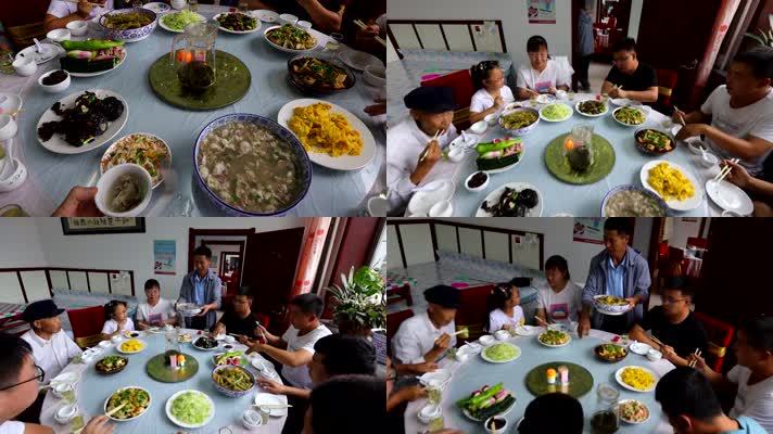 一家人一家老小老人孩子做一起吃饭满桌子菜