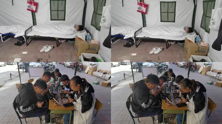 志愿者在防疫帐篷睡觉吃盒饭值班
