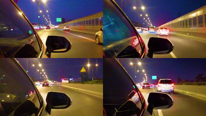 城市夜晚汽车在马路上面奔跑夜景延时摄影