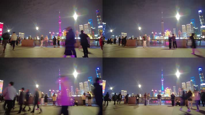 上海外滩夜晚游客在游玩拍照延时摄影
