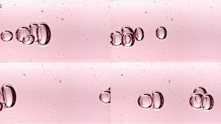 浅粉色背景下水中气泡的宏观拍摄