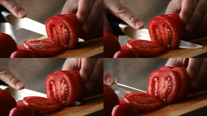 手拿水果刀切番茄