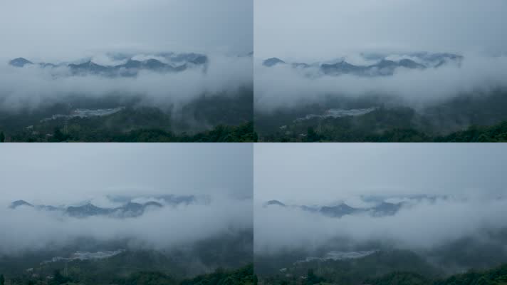 站在山顶俯视群峰的大山云雾缭绕