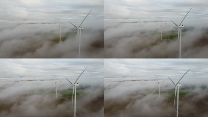 云雾背景下的风力发电、新能源、大风车
