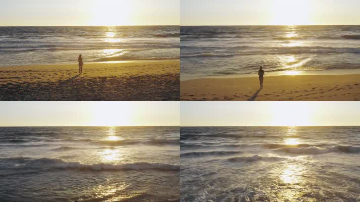 女孩沙滩上跑向大海