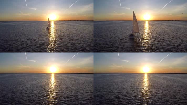 夕阳下海面上的帆船