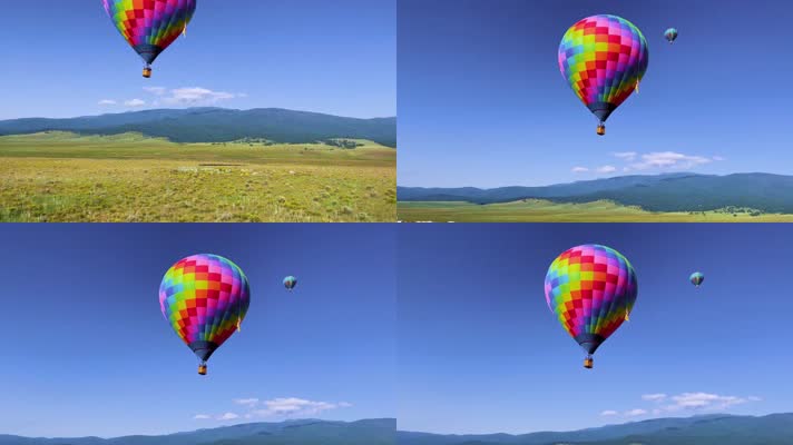 田野上空漂浮的彩色热气球