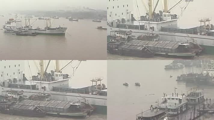 改革开放广州珠江河畔码头货轮吊装货物